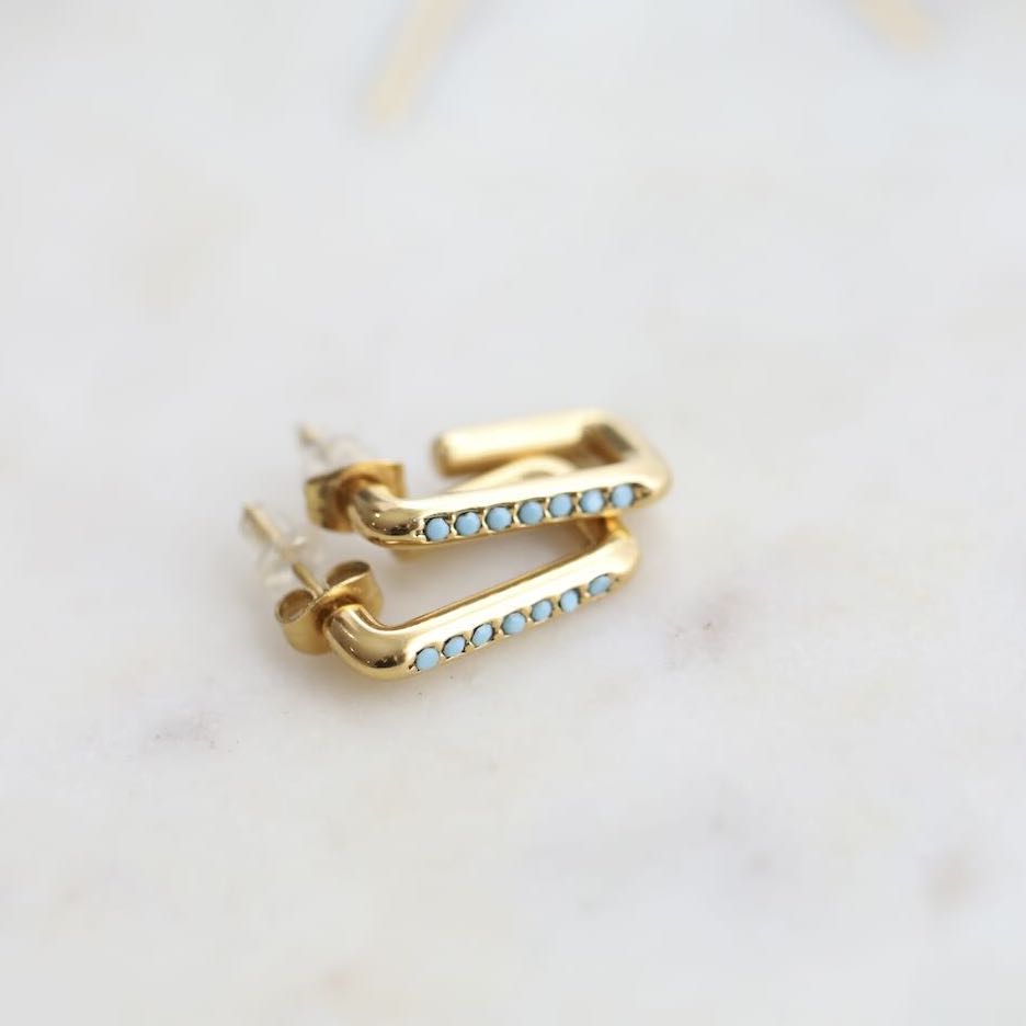 Close-up of Turquoise Stone and Gold Plating in Earrings by Mrs V