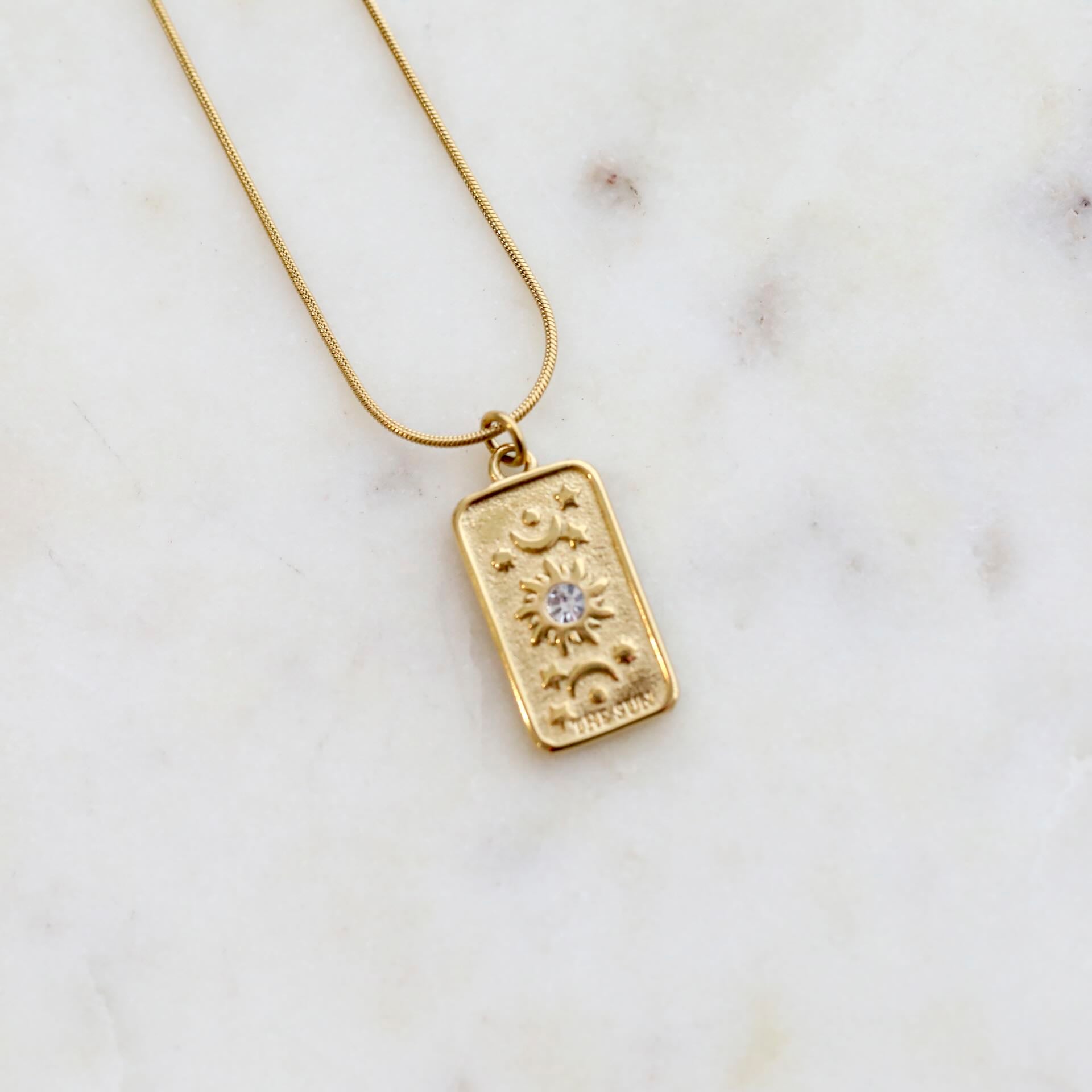 Close-up of Sun Tarot Card Pendant on 18K Gold Necklace by Mrs V